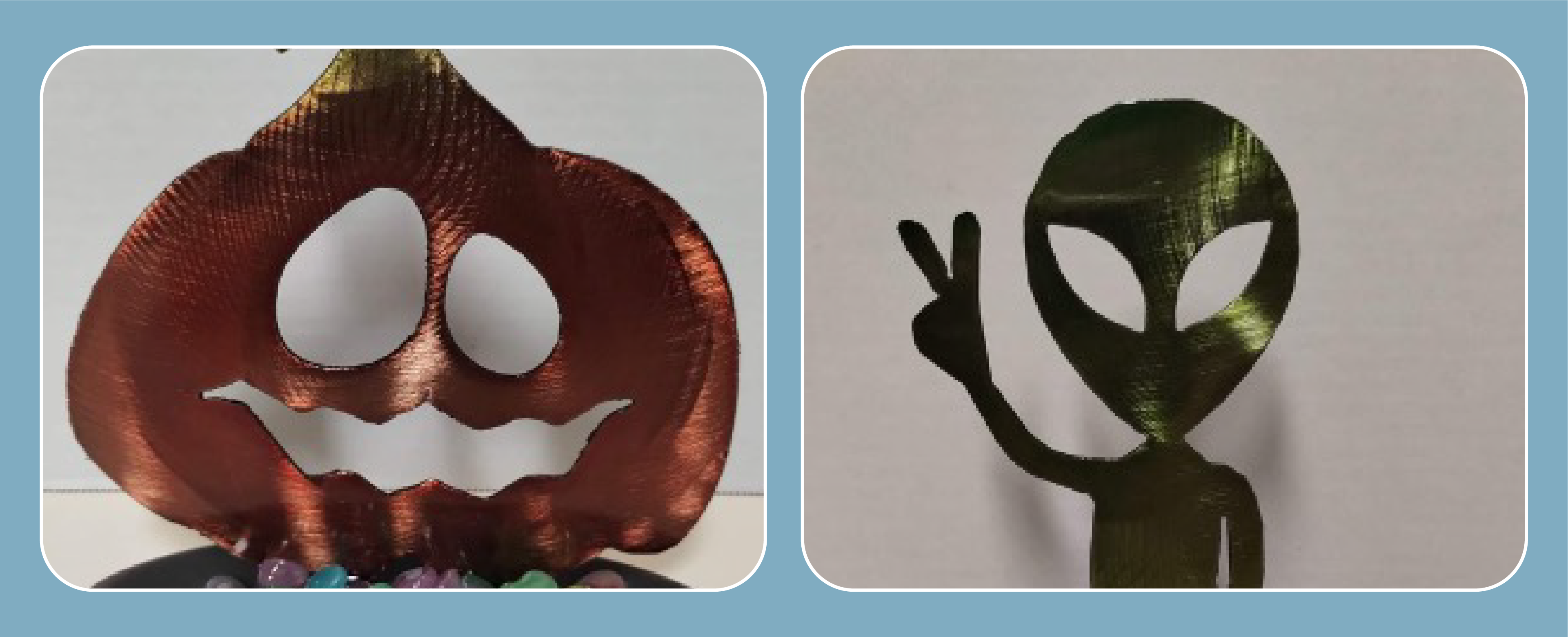 Halloween-themed metal sculptures of a jack-o'-lantern and an alien