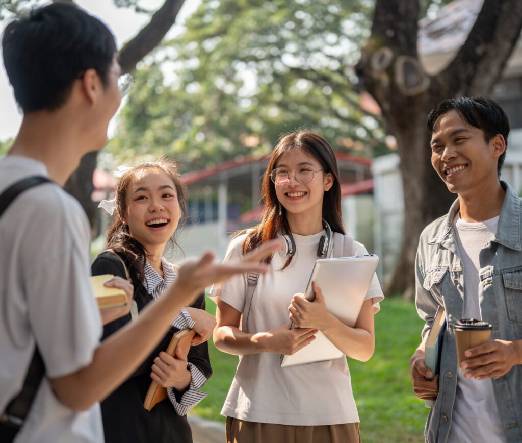 Group of teens standing outside talking