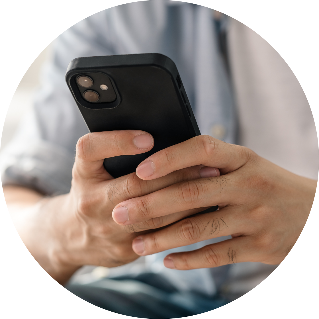 Person holding cell phone
